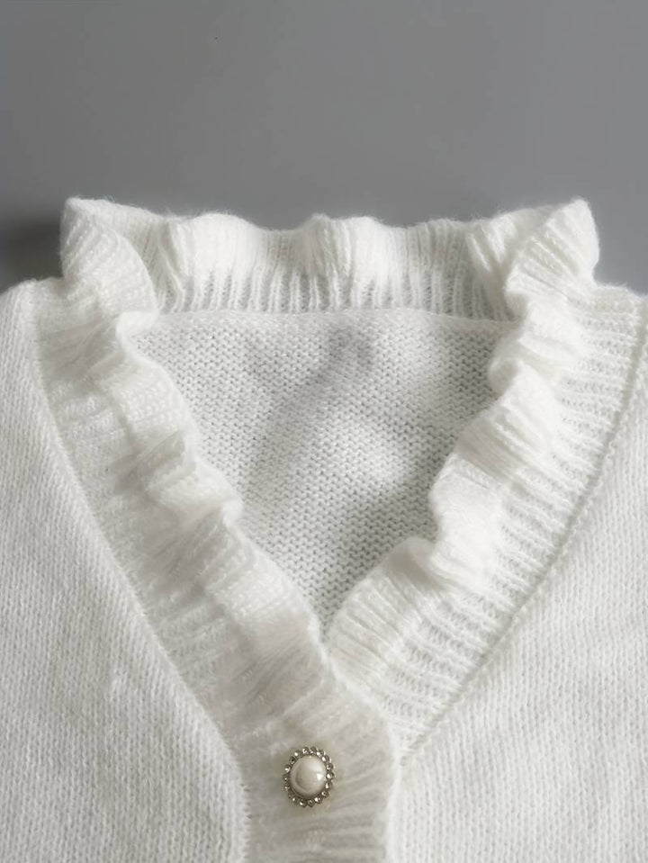 Jenny | Flæse Sweater med Dekorative Knapper til Damer